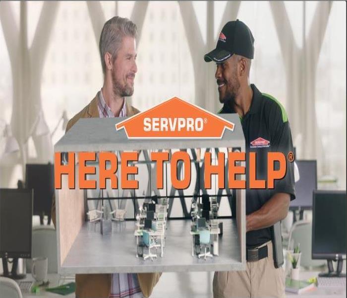 SERVPRO member assisting a client